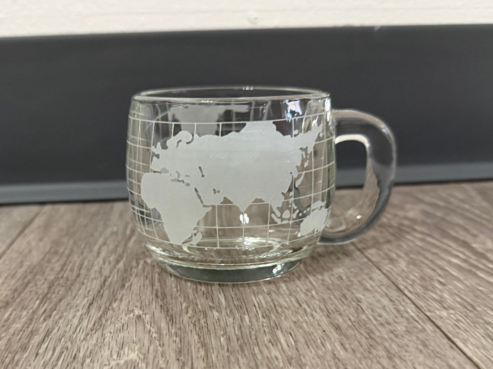 Vintage Nestle Co. Etched Clear Glass World Map Coffee Mug 3"