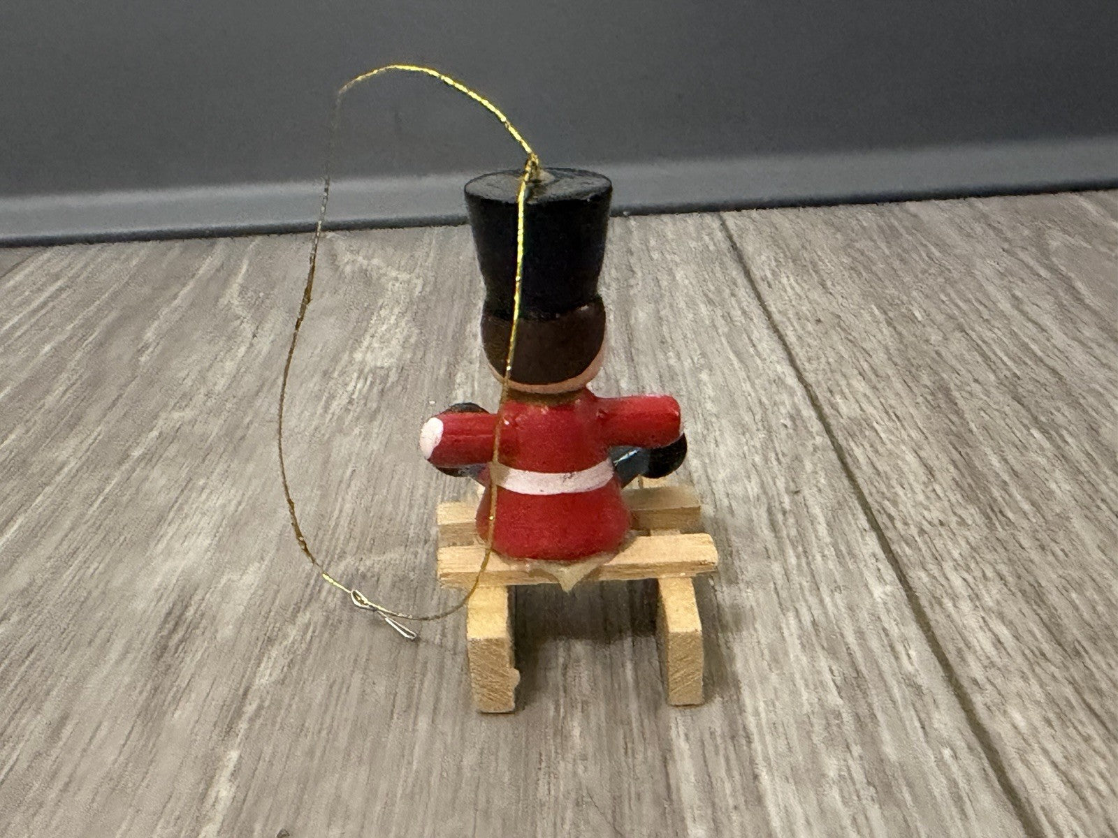 Vintage Tiny Christmas Ornament Boy On A Wooden Sled Handmade Hand Painted