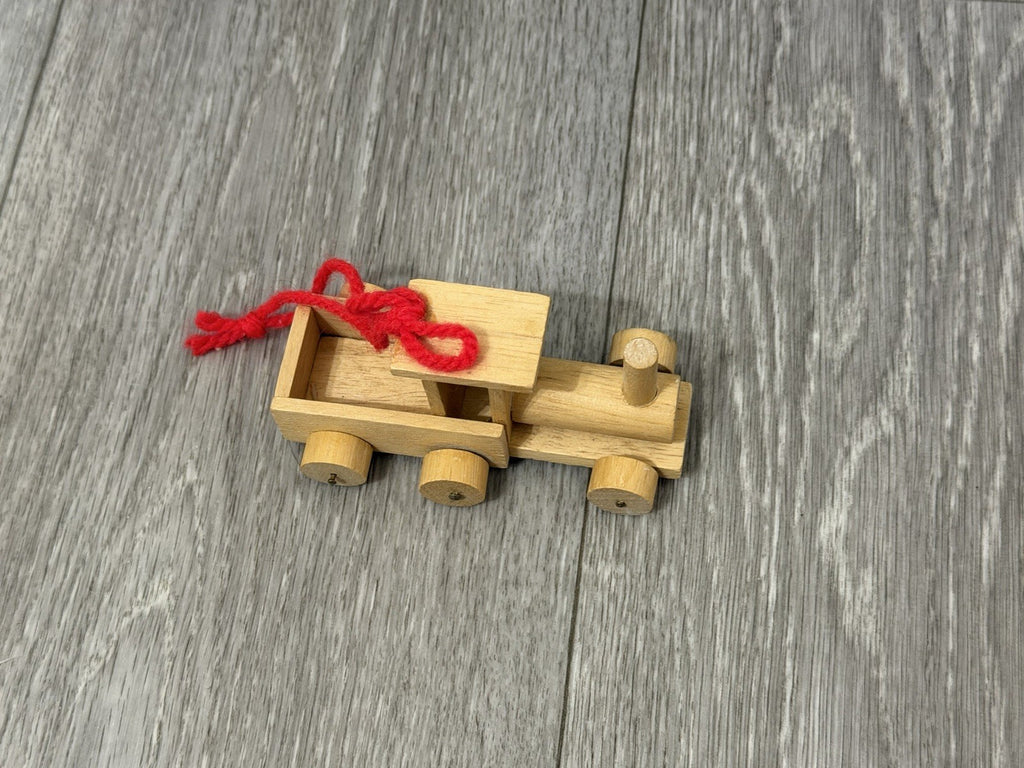 Vint. Wooden Christmas Ornament Unpainted Train Engine W/ Red Yarn Hanging Loop
