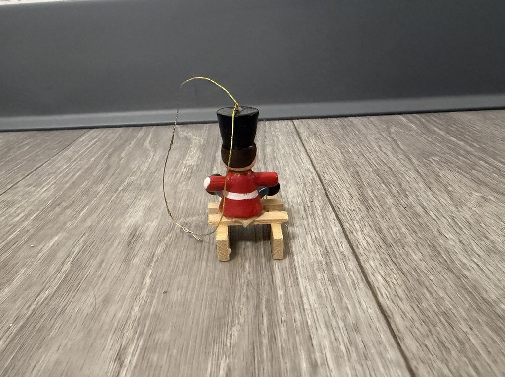 Vintage Tiny Christmas Ornament Boy On A Wooden Sled Handmade Hand Painted