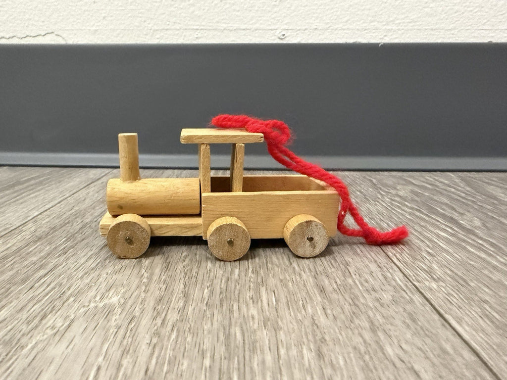 Vint. Wooden Christmas Ornament Unpainted Train Engine W/ Red Yarn Hanging Loop
