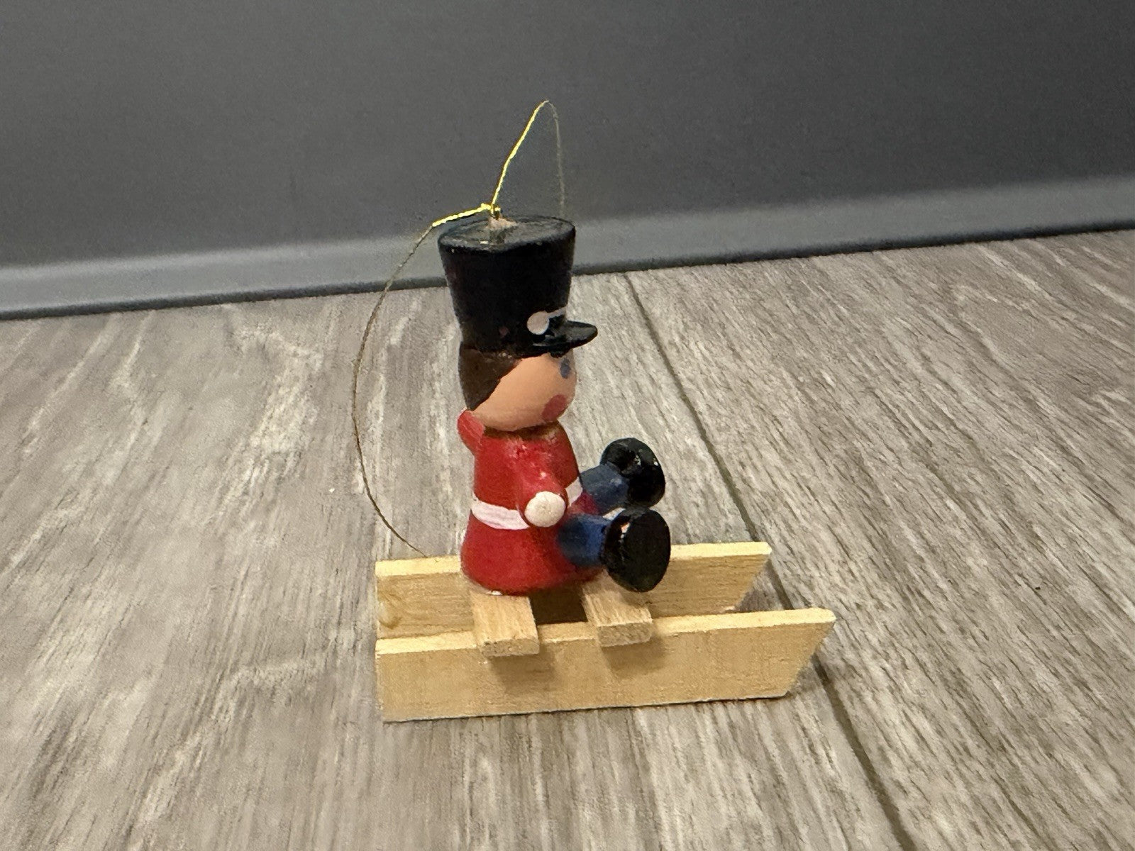 Vintage Tiny Christmas Ornament Boy On A Wooden Sled Handmade Hand Painted