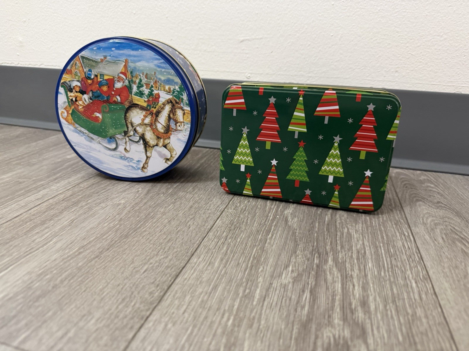 2 Christmas Tins Rnd & Rectangle 6” Diameter & 6.5”x 4.25” Used Great Condition