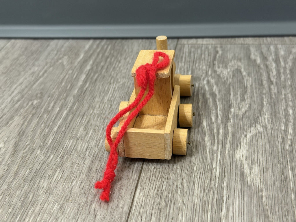 Vint. Wooden Christmas Ornament Unpainted Train Engine W/ Red Yarn Hanging Loop