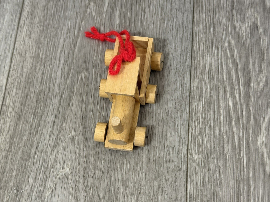 Vint. Wooden Christmas Ornament Unpainted Train Engine W/ Red Yarn Hanging Loop